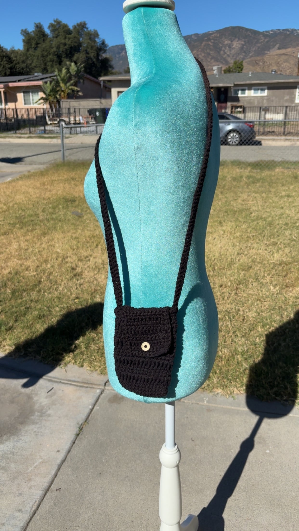 cross body minimal bag with closing strap